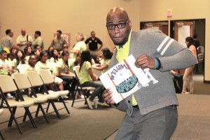 In this image, a SuperCamp Facilitator in Training welcomes students to SuperCamp.