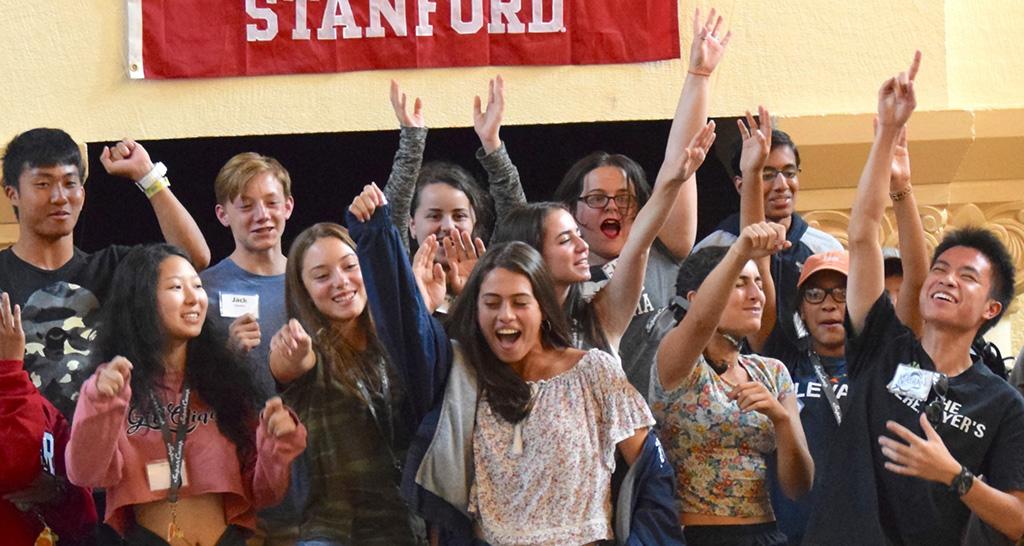 Students celebrate on stage at SuperCamp